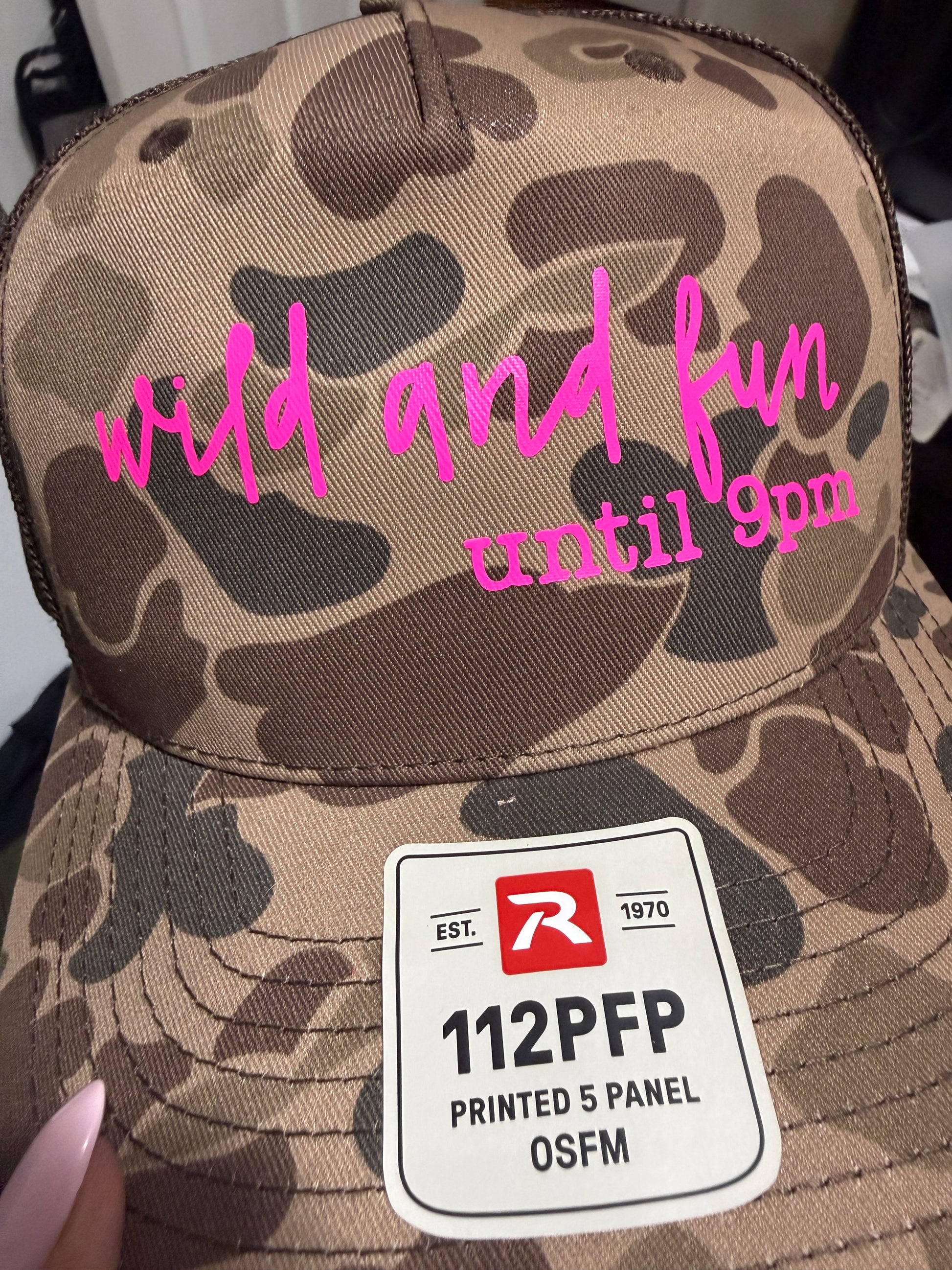 Wild and Fun Until 9pm dark green camo Otto foam trucker hat with hot pink font